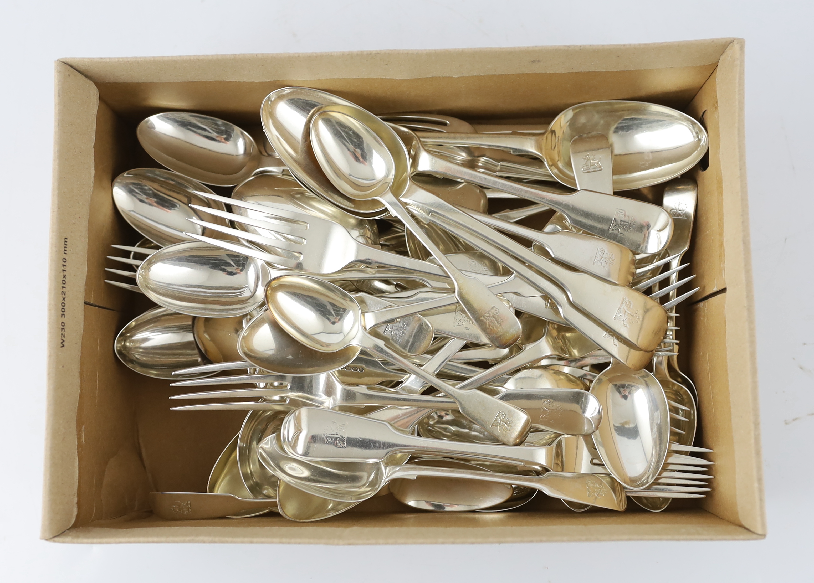 A part canteen of Victorian silver fiddle pattern flatware, by George Adams